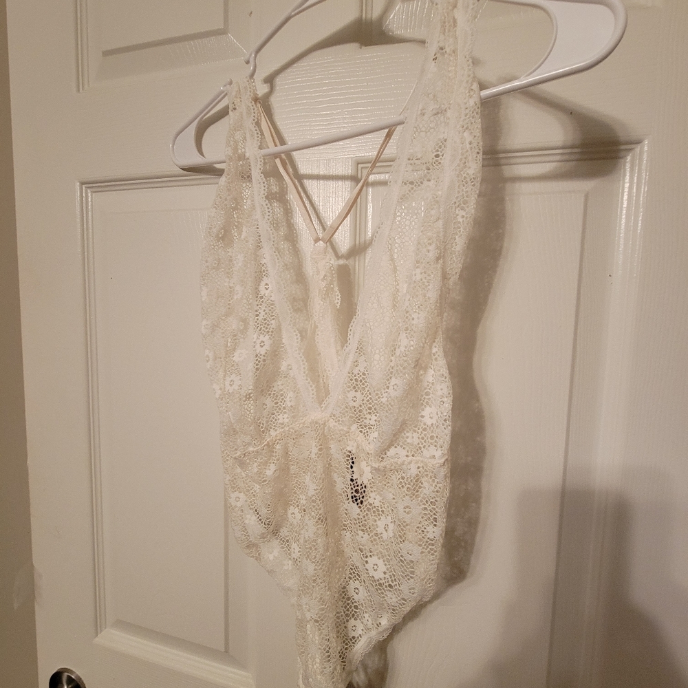 Lace Teddy, with adjustable straps.